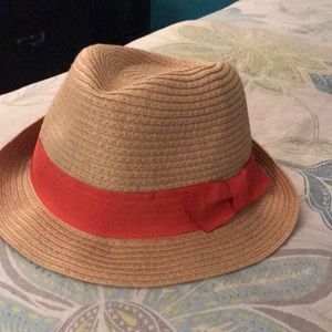 Tan fedora with red ribbon
